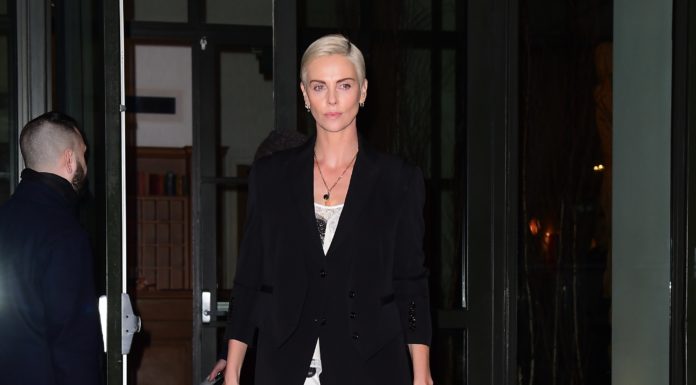 Charlize Theron Steps Out In White Lace Dress For The Late Show In NYC Charlize Theron Steps Out In White Lace Dress For The Late Show In NYC
