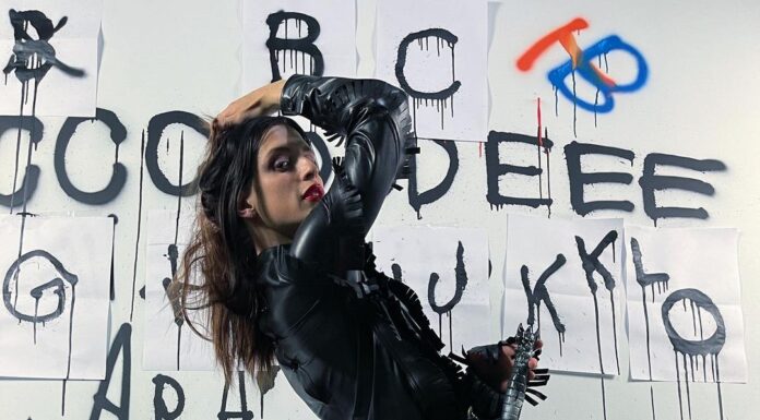 Arca wearing Burberry Arca wearing Burberry