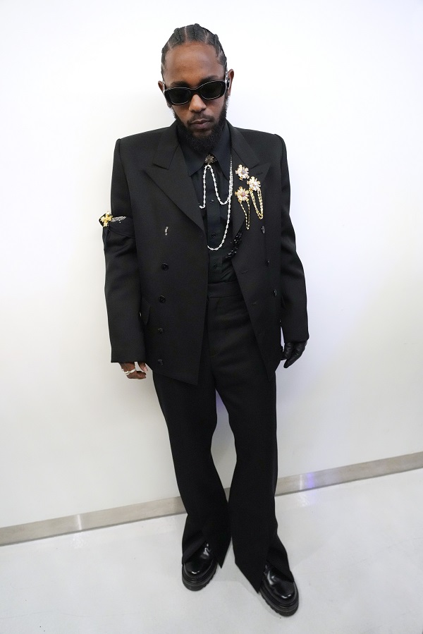 Kendrick Lamar wears Louis Vuitton while performing at the 2022 Super Bowl LVI Half Time Show.