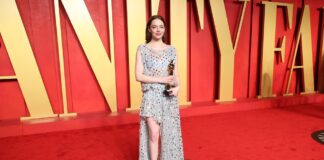 Emma Stone wears Louis Vuitton and High Jewelry to the 2024 Vanity Fair Oscar Party