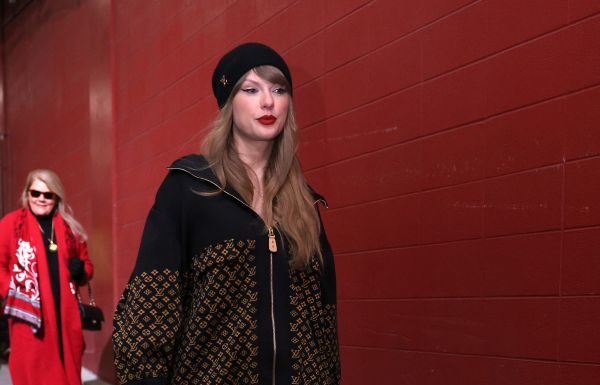 Taylor Swift wears Louis Vuitton in Kansas City Taylor Swift Wears a Monogram Louis Vuitton Jacket to Chiefs Playoff Game