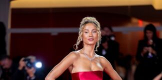Rose Bertram walk the Red Carpet of Den Sidste Viking (The Last Viking) at the 82° Venice International Film Festival dressed in GENNY