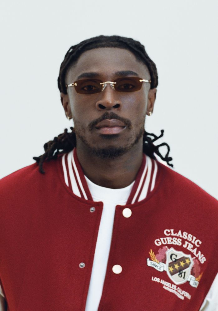 GUESS JEANS Eyewear presenta l'anteprima della nuova collezione con Moise Kean